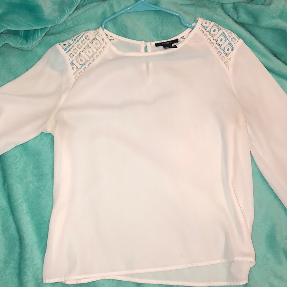 Light cream blouse with lace accent shoulders